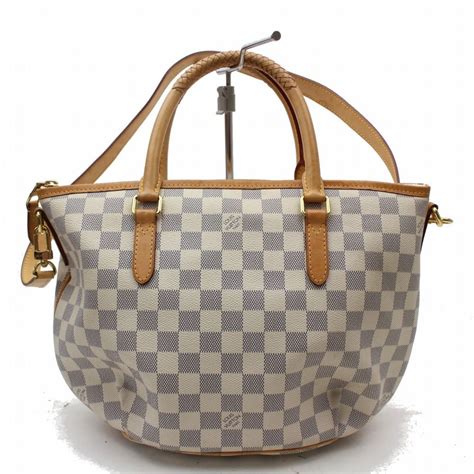 cream colored louis vuitton bag